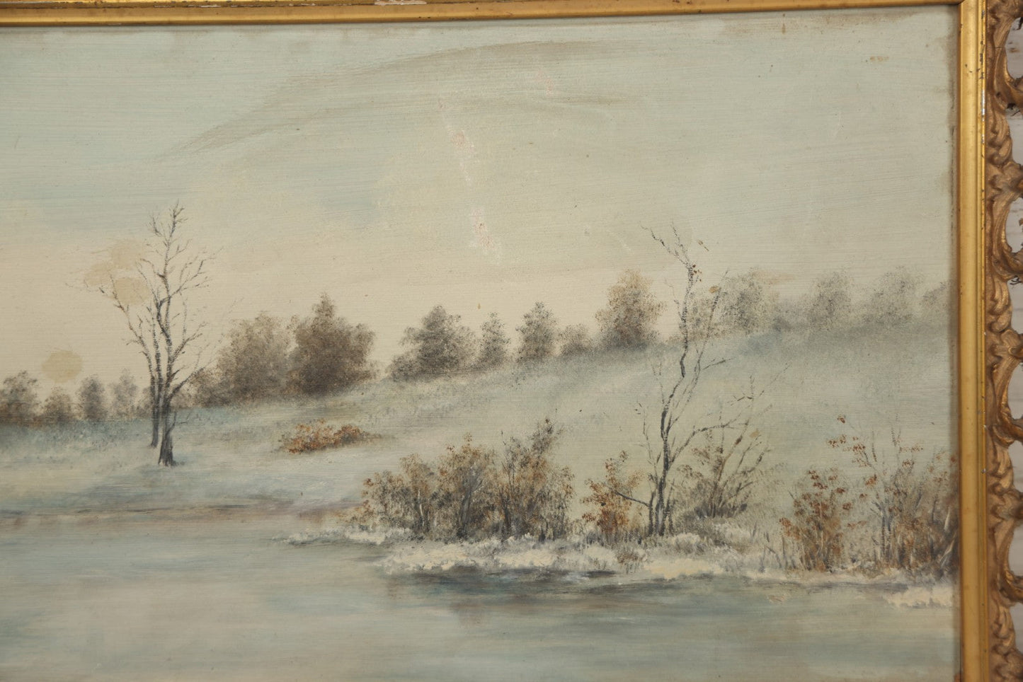 Lot 054 - Antique Oil On Board Landscape Painting Depicting Winter Scene With Trees And River Scene In Gilt Frame, 22-1/8" x 11-5/8"