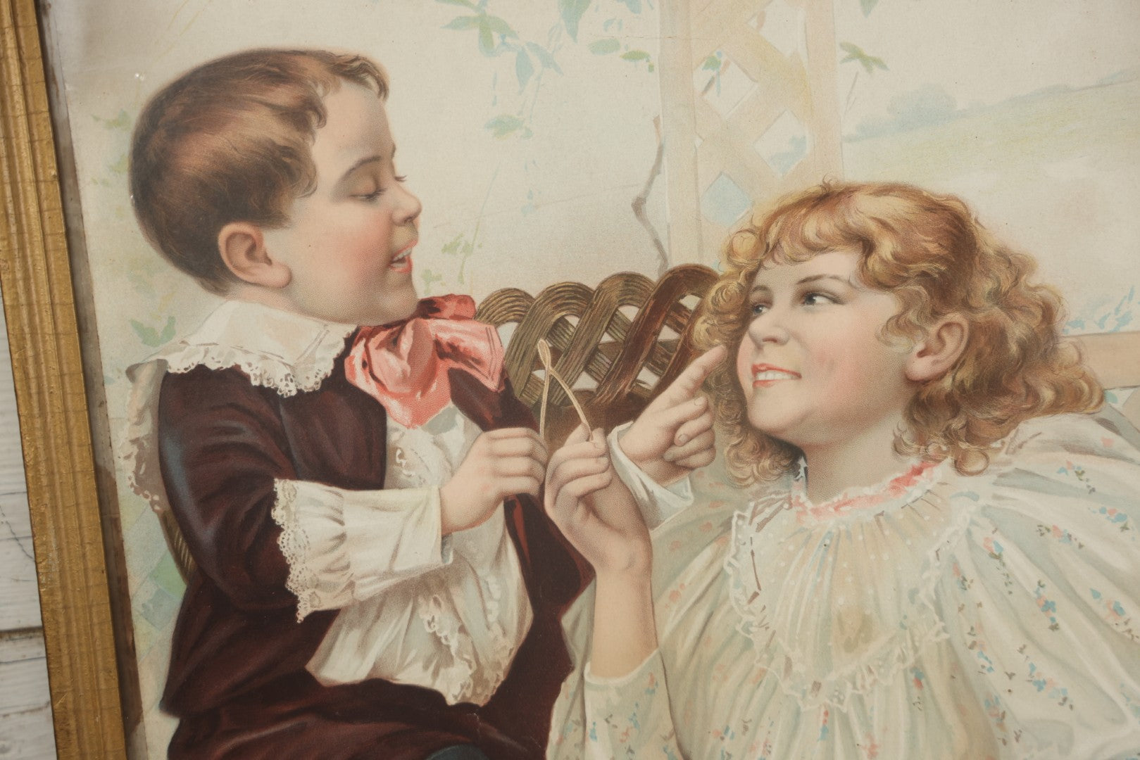 Lot 057 - Antique Chromolithograph "Now Pull Fair" Depicting Young Boy And Girl Smiling And Flirting While Pulling A Wishbone, Framed, 16" x 19-1/4"