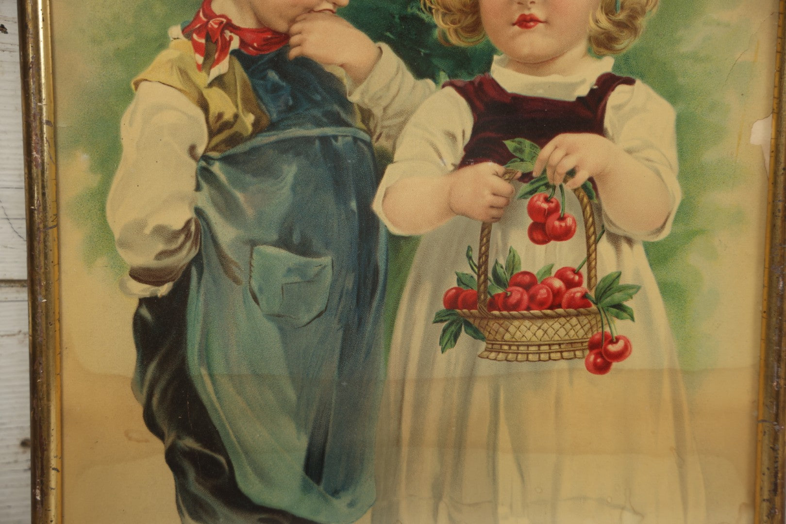 Lot 058 - Antique Chromolithograph Of Young Boy And Girl, Girl Holding Basket Of Cherries And Boy Sucking Thumb, Framed, 14-5/8" x 18-5/8"