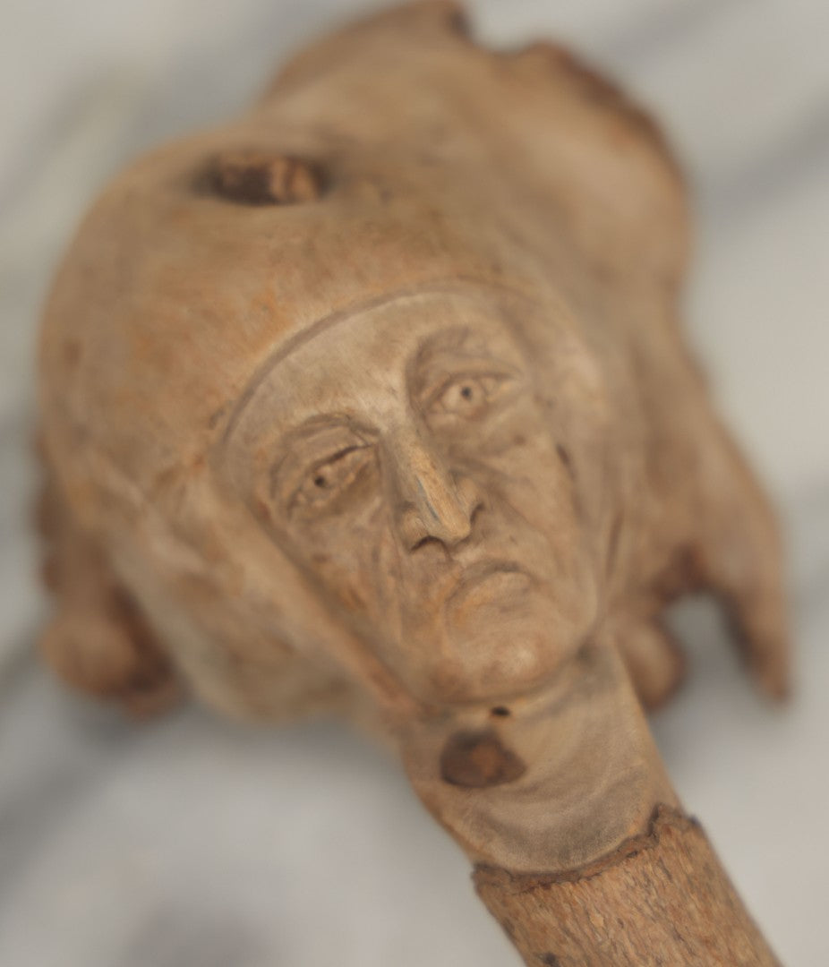 Lot 065 - Vintage Folk Art Carved Driftwood Branch Depicting Frowning, Stoic Native American Man, Longer Branch