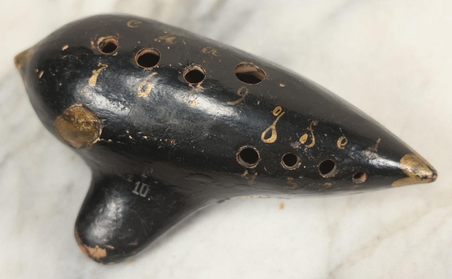 Lot 066 - Vintage Black Lacquered Clay Ocarina Wind Instrument, Made In Vienna, Austria, With Gold Painted Details, Stamped Maker's Mark