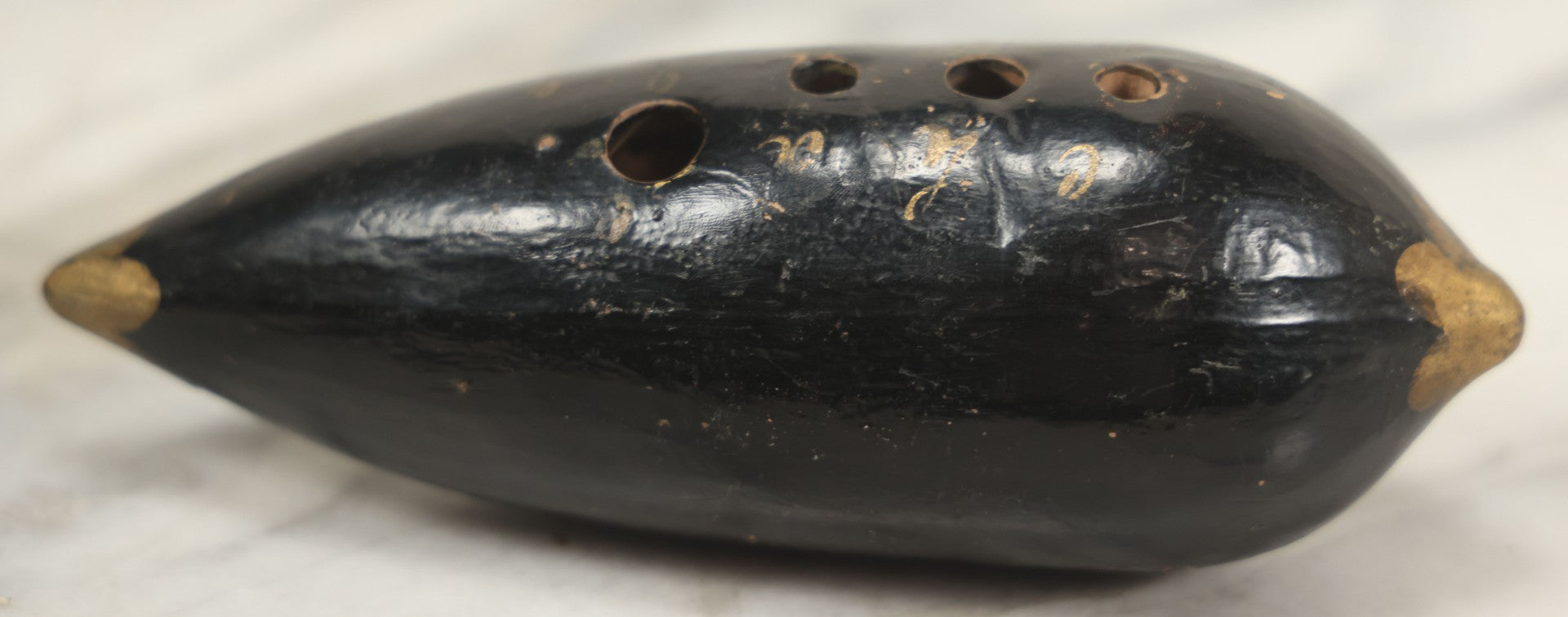 Lot 066 - Vintage Black Lacquered Clay Ocarina Wind Instrument, Made In Vienna, Austria, With Gold Painted Details, Stamped Maker's Mark