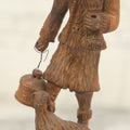 Lot 069 - Antique Folk Art Hand Carved Wooden Man Holding Lamp, With Goat At His Feet.