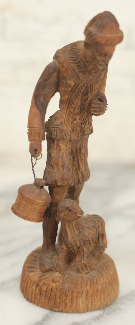 Lot 069 - Antique Folk Art Hand Carved Wooden Man Holding Lamp, With Goat At His Feet.