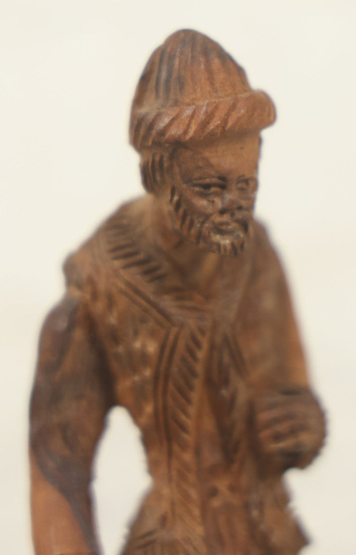 Lot 069 - Antique Folk Art Hand Carved Wooden Man Holding Lamp, With Goat At His Feet.