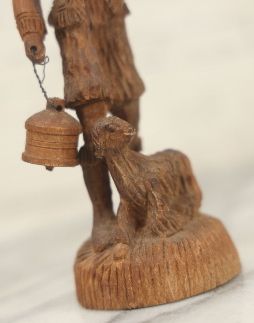Lot 069 - Antique Folk Art Hand Carved Wooden Man Holding Lamp, With Goat At His Feet.