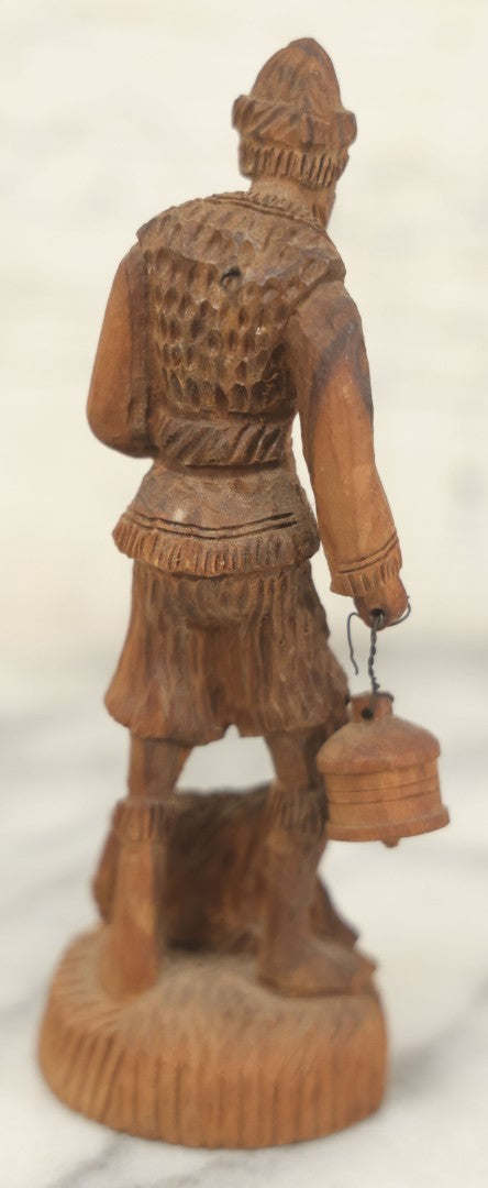 Lot 069 - Antique Folk Art Hand Carved Wooden Man Holding Lamp, With Goat At His Feet.
