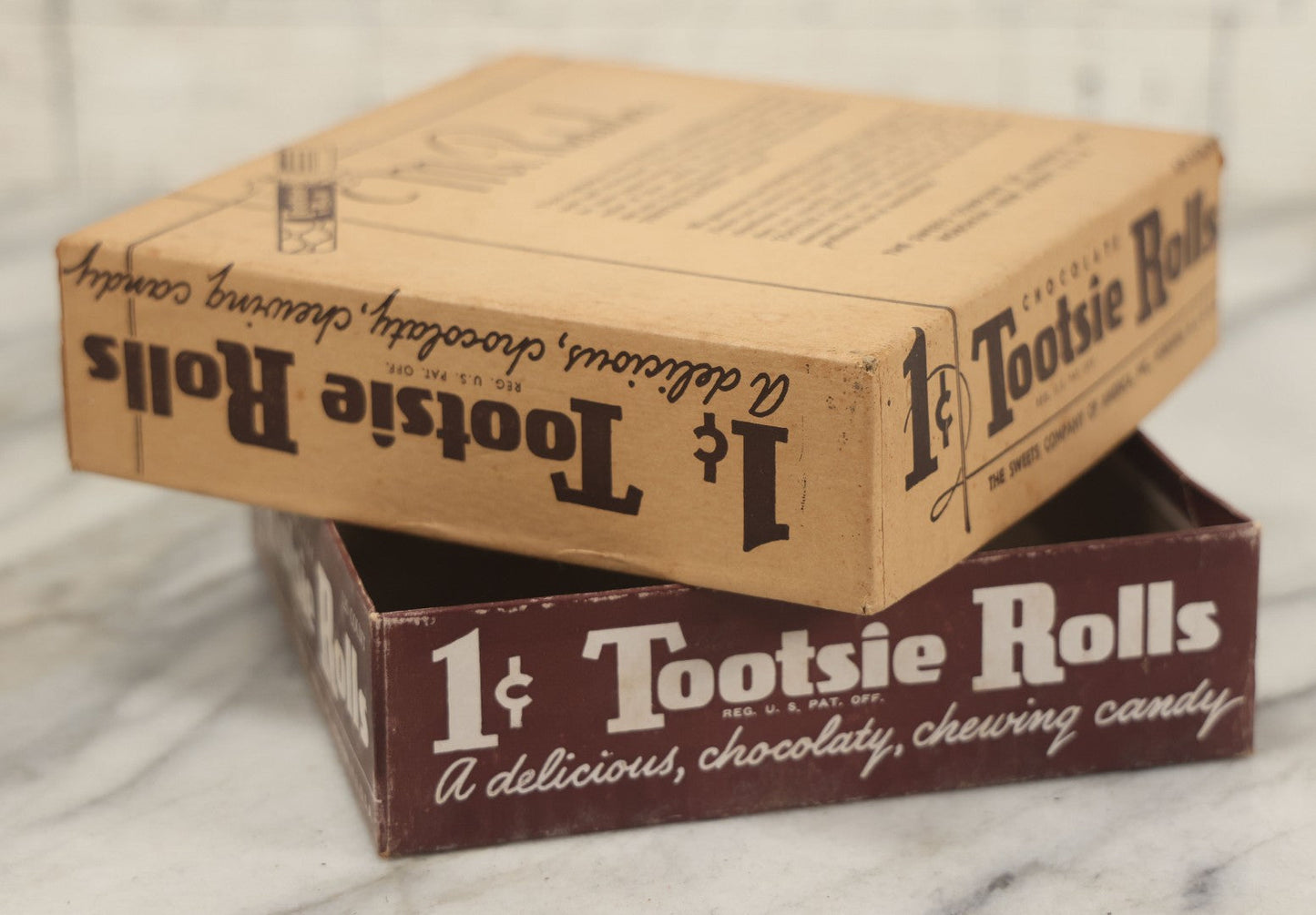 Lot 076 - Vintage Pressboard Advertising Retail Store Display Box For Chocolate Tootsie Rolls, "A Delicious Chocolate Chewing Candy," 120 Count Capacity, 1C Price, Manufactured By The Sweets Company Of America, Inc., Hoboken, New Jersey,
