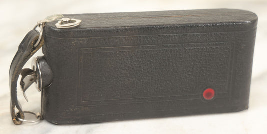 Lot 085 - Vintage Drinking Flask Disguised As Antique Folding Camera With Internal Pyrex Glass Flask, Note Missing Screw And Worn Stopper