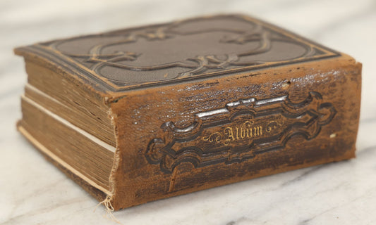 Lot 089 - Antique Family Photo Album With 26 Carte De Visite C.D.V. Photographs And 15 Tintypes Of A Providence, Rhode Island Family, Note Poor Condition With Loose Pages And Missing Clasp Decoration