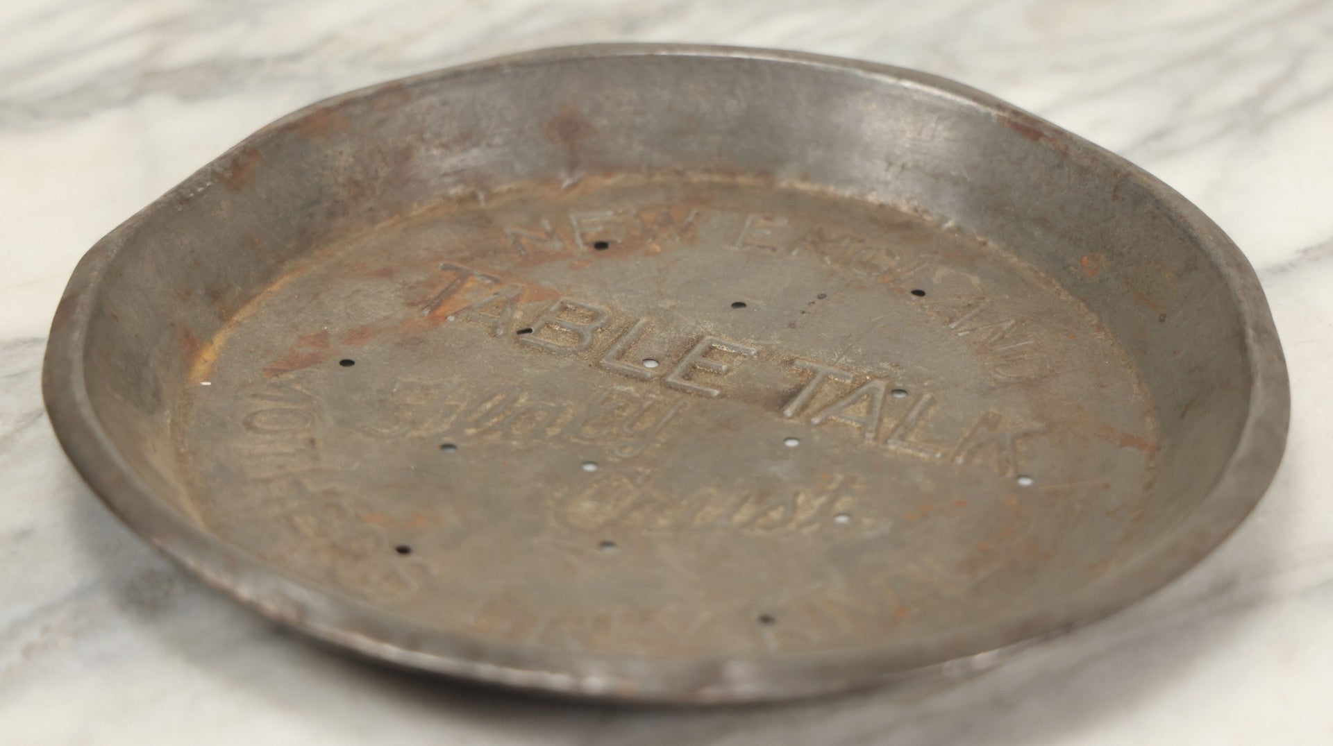 Lot 099 - Vintage Pressed Tin Pie Tray Advertising New England Table Talk Flaky Crust, “Mother's Only Rival”