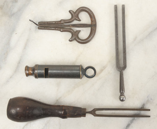 Lot 105 - Grouping Of Four Antique Musical Items Including Two Tuning Forks, Whistle, And Mouth Harp