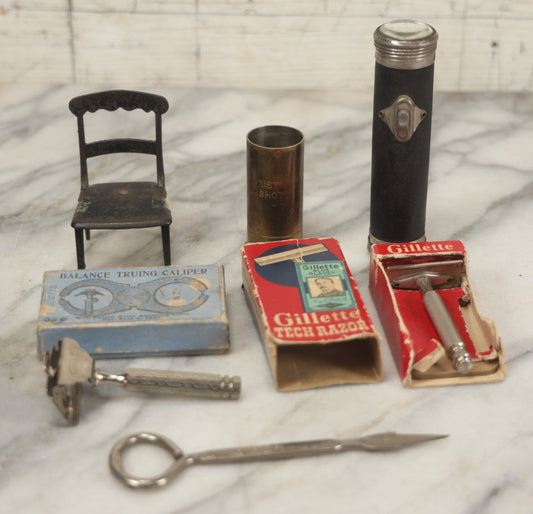 Lot 106 - Grouping Of Seven Vintage And Antique Metal Items Including Battery Flashlight, Gillette Tech Razor, Balance Tracing Caliper, Brass “Just A Shot” Shot Glass, Metal Toy Chair, And Ice Pick From Kendall's Bakery