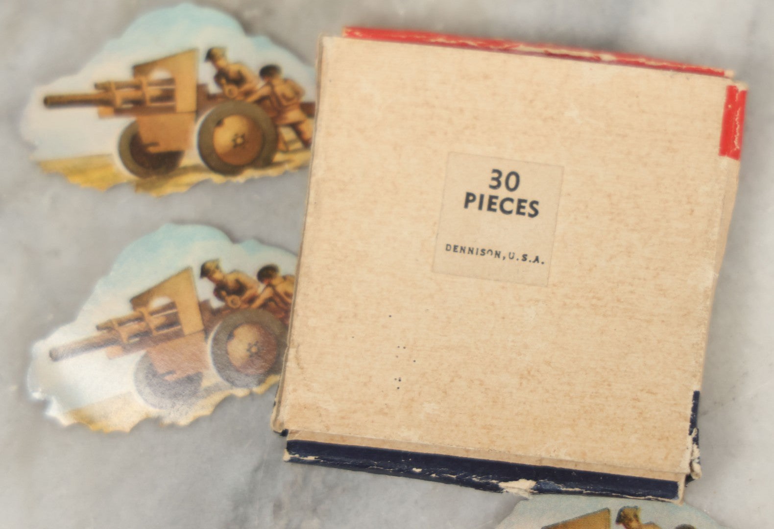 Lot 112 - Box Of Dennison World War I Era Seals With Soldiers Operating Artillery, 5 Of 30 Remaining, Box Damaged