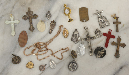 Lot 126 - Grouping Of 10+ Vintage Religious Items Including Crucifixes, Charms, “Our Father” Dog Tag, Pinback Button, And More