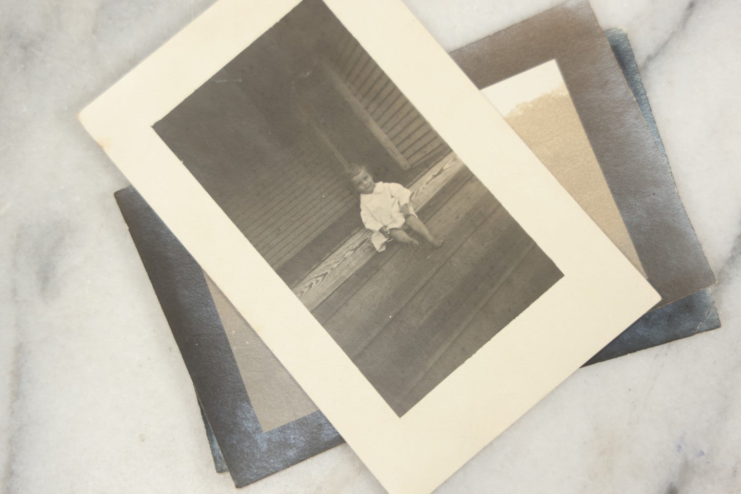 Lot 169 - Grouping Of 12 Antique Real Photo Postcards R.P.P.C., Including Cards Featuring Well Dressed Men And Women, Posing On Dock, In Field, With Babies