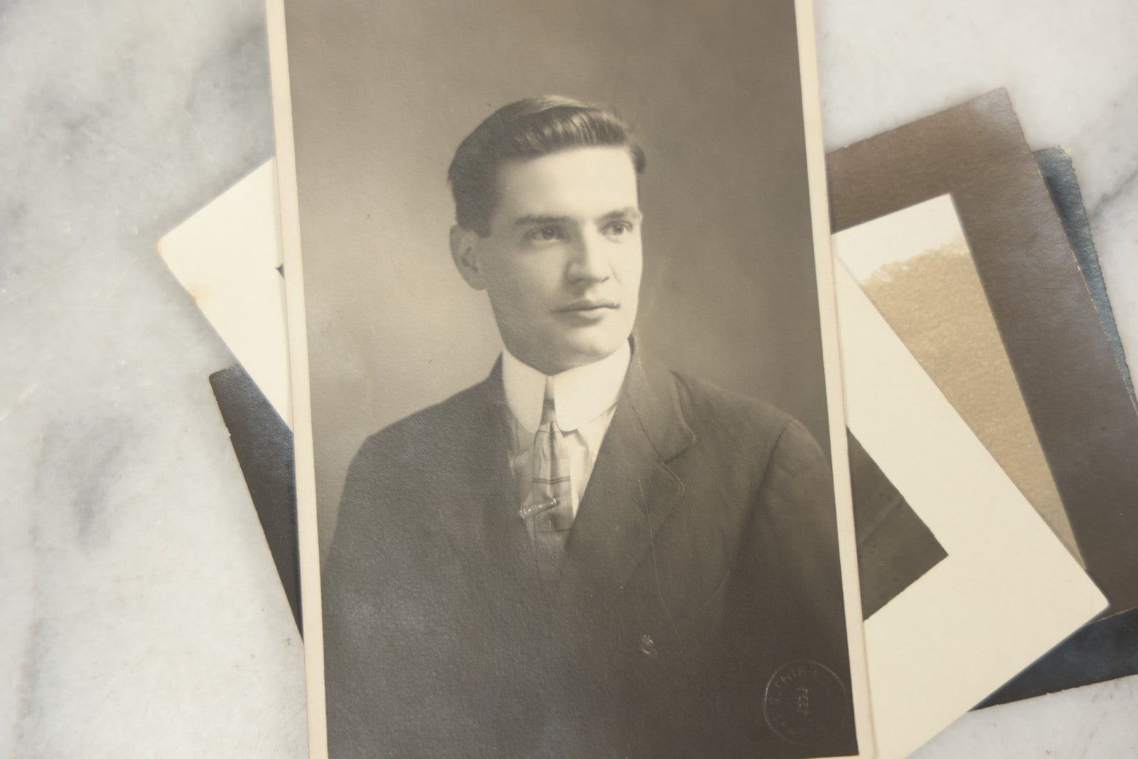 Lot 169 - Grouping Of 12 Antique Real Photo Postcards R.P.P.C., Including Cards Featuring Well Dressed Men And Women, Posing On Dock, In Field, With Babies