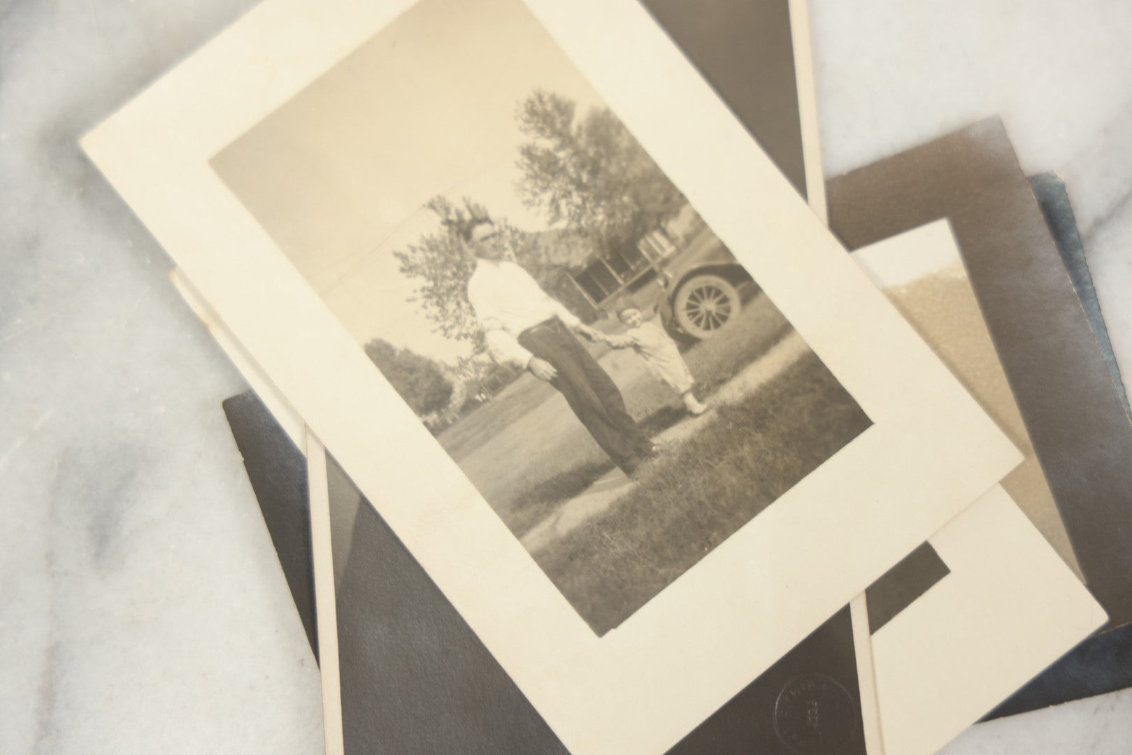 Lot 169 - Grouping Of 12 Antique Real Photo Postcards R.P.P.C., Including Cards Featuring Well Dressed Men And Women, Posing On Dock, In Field, With Babies
