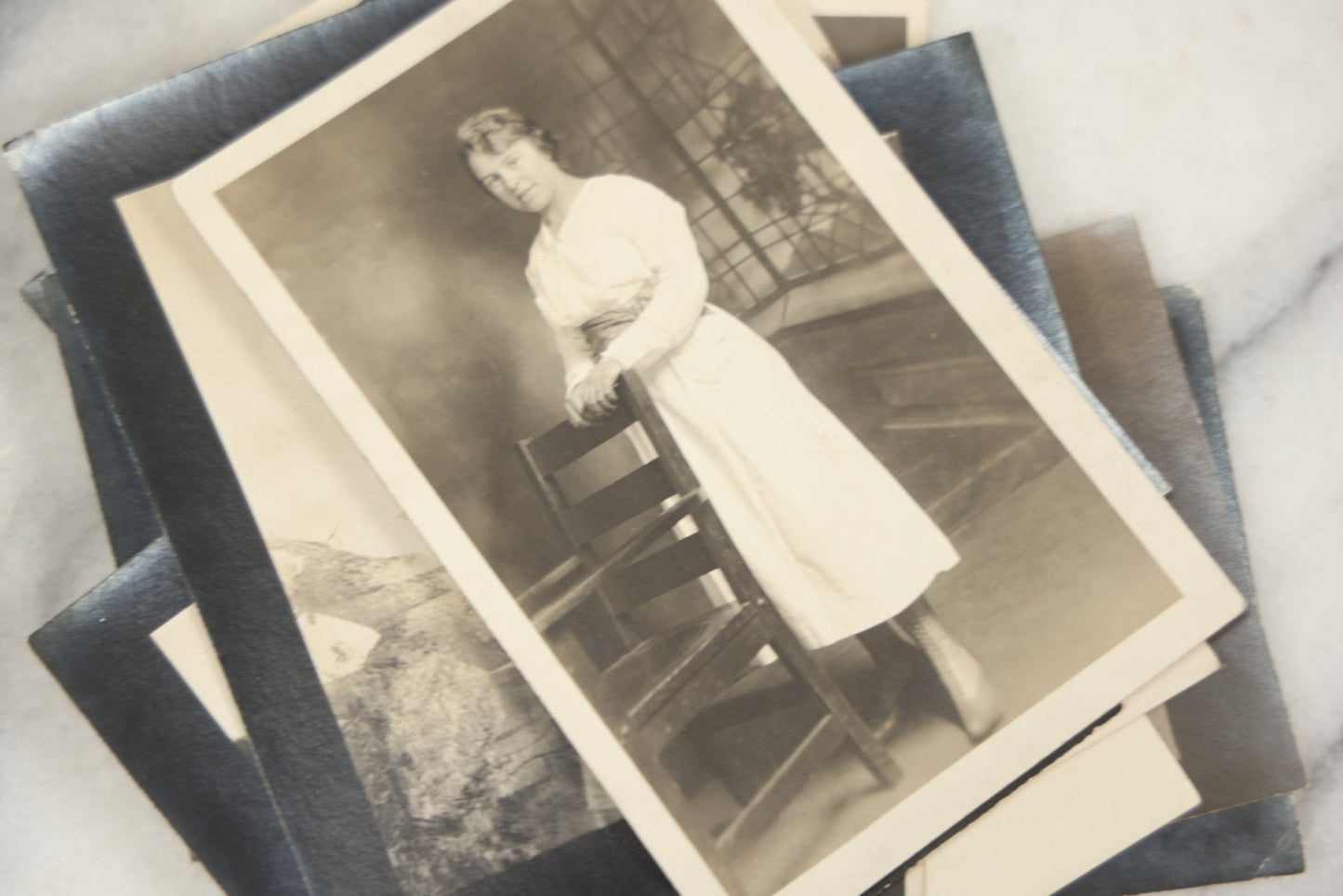 Lot 169 - Grouping Of 12 Antique Real Photo Postcards R.P.P.C., Including Cards Featuring Well Dressed Men And Women, Posing On Dock, In Field, With Babies