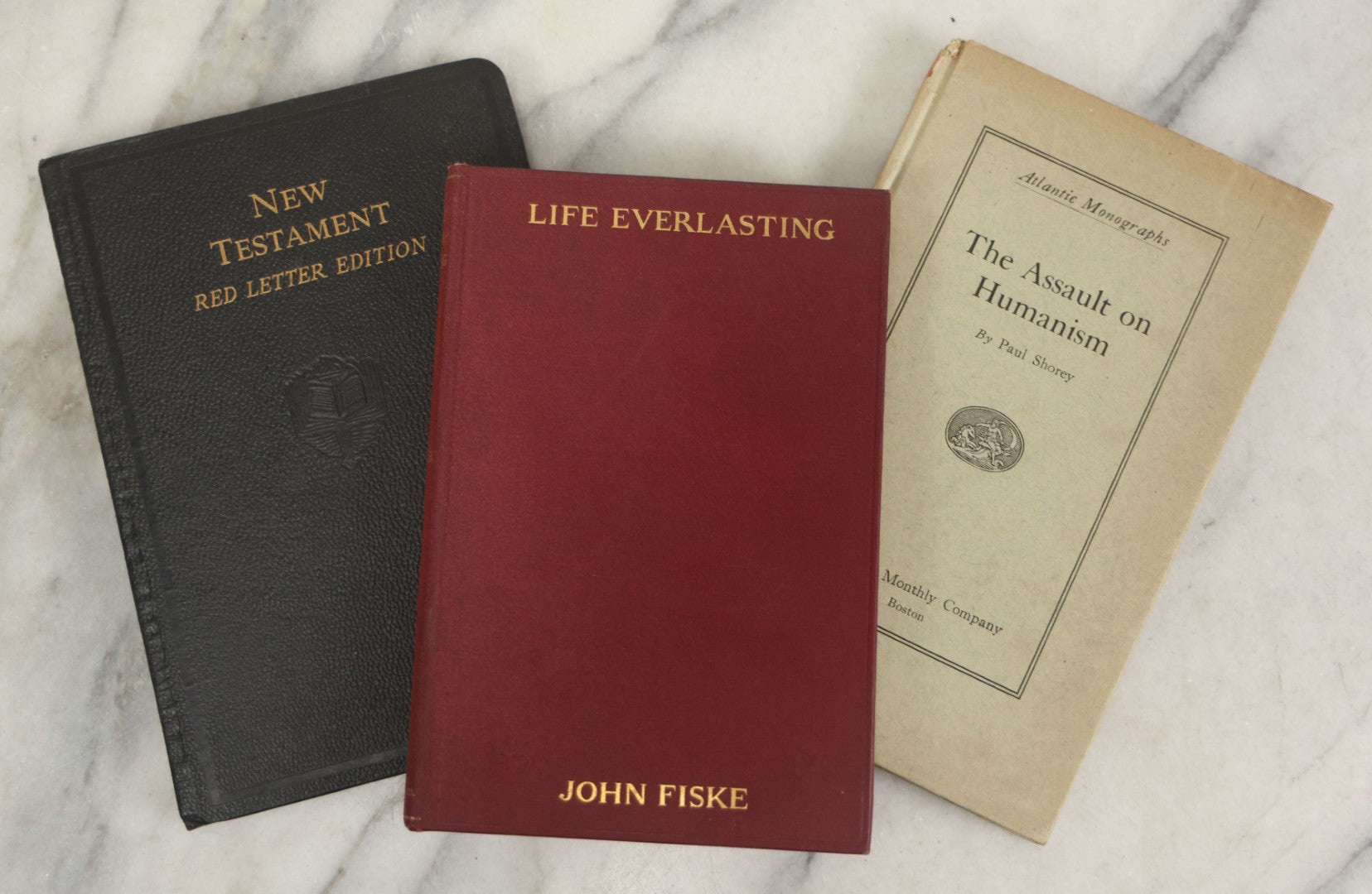 Lot 175 - Grouping Of Three Antique And Vintage Religious Books, Including "Life Everlasting" By John Fiske (1902), "The Assault On Humanism" By Paul Shorey (1917), And The New Testament Red Letter Edition (Circa 1939)