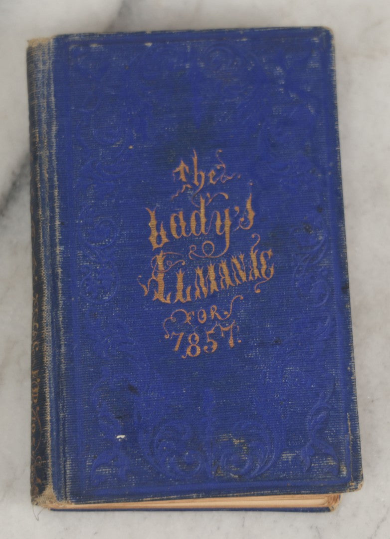 Lot 180 - Pair Of Antique Pocket Almanac Books, Including "Lady's Almanac For The Year 1857" With Brilliant Blue Full Page Advertisements, And "The Boston Almanac" For 1848 With Fold-Out Map Of Boston