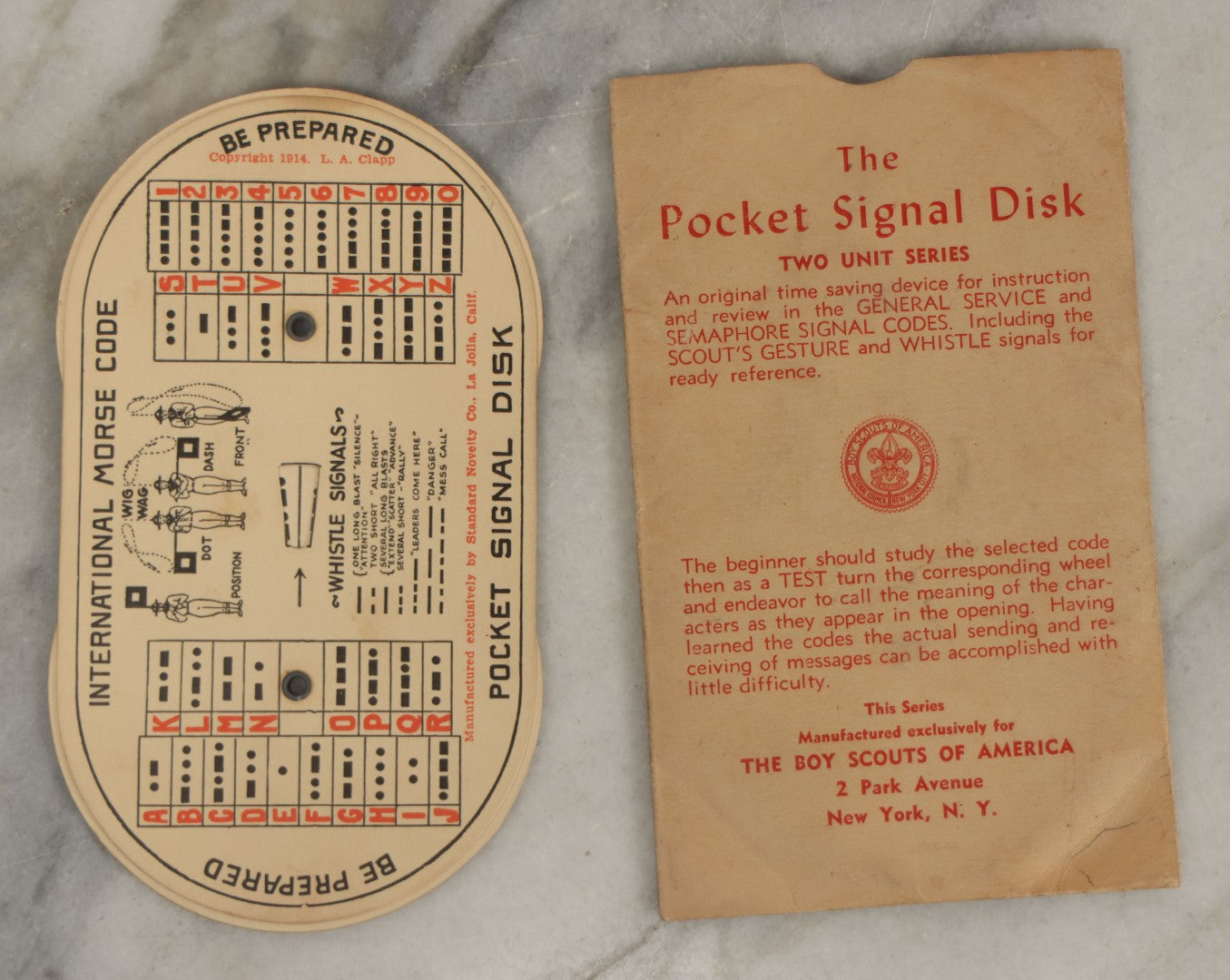 Lot 184 - Pair Of Vintage Boy Scout Items Including April 1939 Scouting Magazine And Pocket Signal Disk With Sleeve