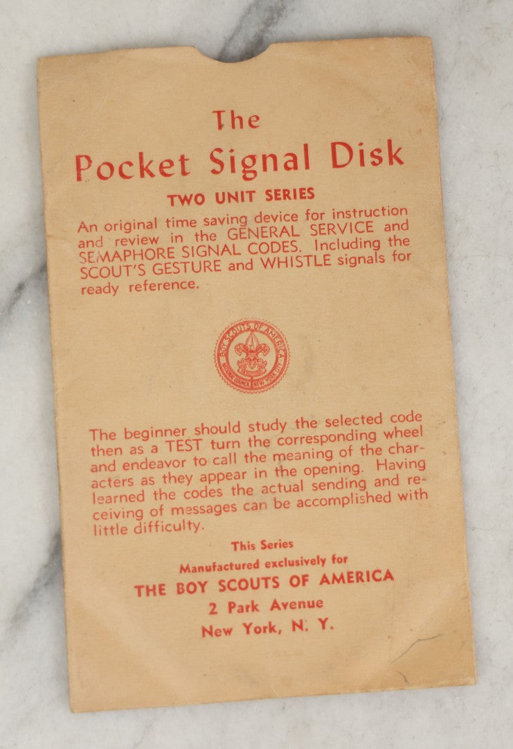 Lot 184 - Pair Of Vintage Boy Scout Items Including April 1939 Scouting Magazine And Pocket Signal Disk With Sleeve