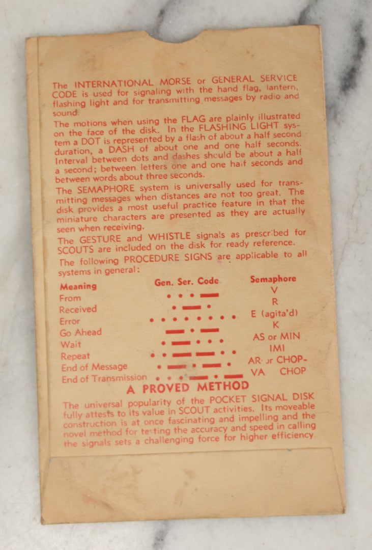Lot 184 - Pair Of Vintage Boy Scout Items Including April 1939 Scouting Magazine And Pocket Signal Disk With Sleeve