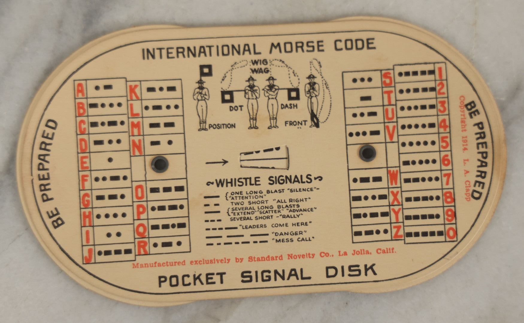 Lot 184 - Pair Of Vintage Boy Scout Items Including April 1939 Scouting Magazine And Pocket Signal Disk With Sleeve