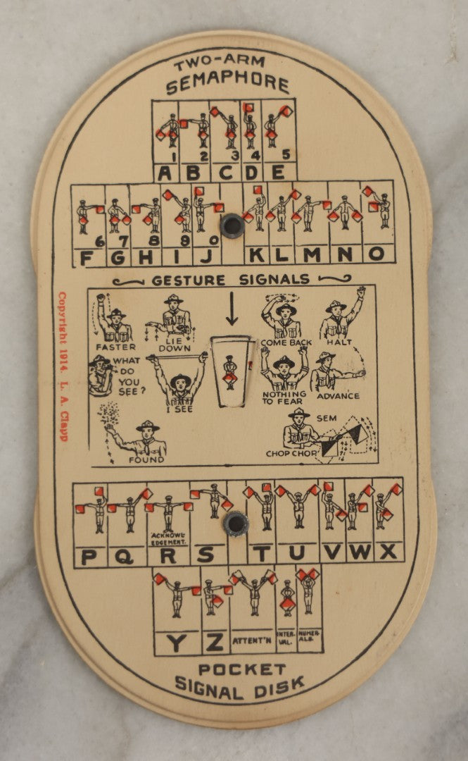 Lot 184 - Pair Of Vintage Boy Scout Items Including April 1939 Scouting Magazine And Pocket Signal Disk With Sleeve