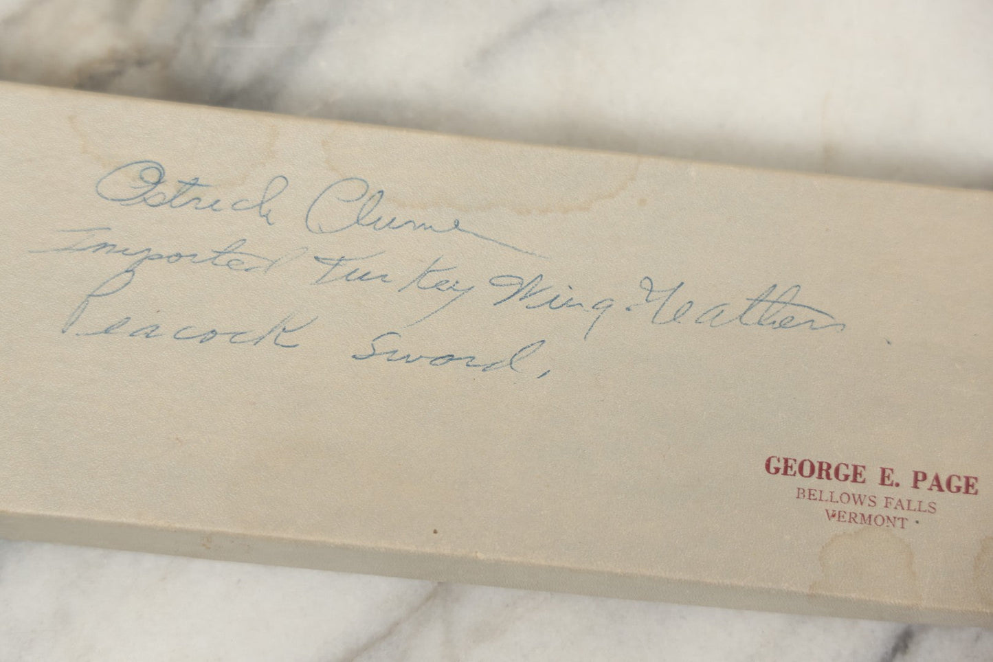 Lot 188 - Boxed Lot Of Antique Decorative Feathers Including Peacock Sword, Ostrich Plume, And Imported Turkey Wing Feathers, In George E. Page Box, Bellows Falls, Vermont, As Found