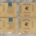 Lot 189 - Grouping Of Four Vintage Barking Dog Cigarette Pack Labels, “Good & Mild,” Continental Tobacco Co., With Two Retaining Blue Tax Stamps, Circa Early 20th Century, Note Wear And Losses