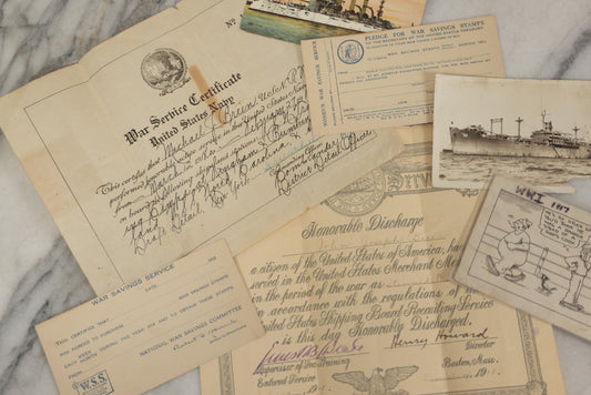Lot 190 - Grouping Of Seven Antique World War I Related Ephemera Items Including Discharge Papers For John Joseph Breen And Michael J. Breen, Comic Postcard, And War Savings Stamps Forms, Circa 1910s–1920s