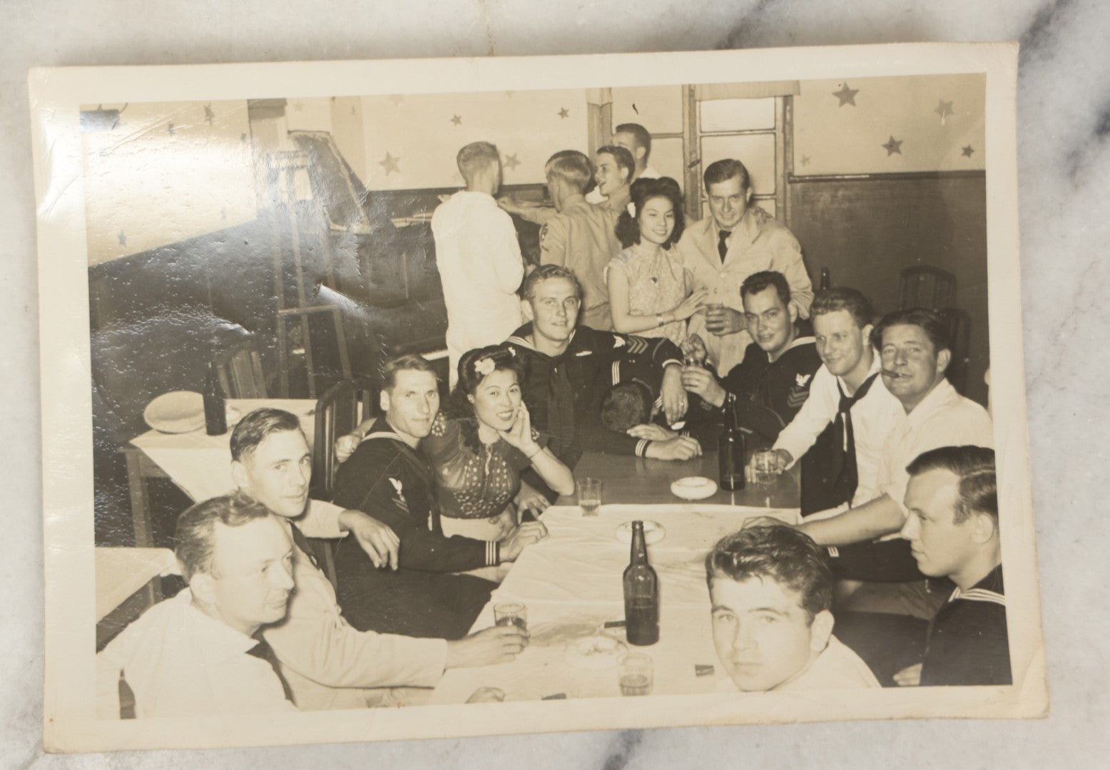 Lot 191 - Grouping Of Five World War II Era Snapshot Photographs Of U.S. Navy Sailors, Including Group Portraits And Social Scenes With Women, Circa 1940s