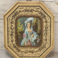 Lot 004 - Antique Miniature Print with Painted Details Of Fancy Woman In Blue, In Bone Frame, Signed "Zuley", With Brass Lip Around Glass, Fabric Cover On Verso, Frame Decorated With Painted Black Flower Border, 3" x 3-5/8"