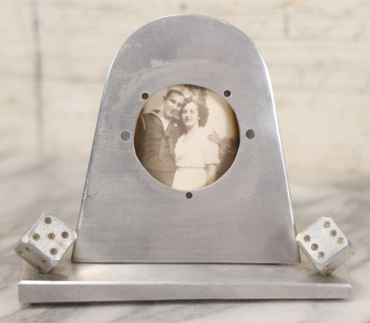 Lot 005 - Vintage Machined Aluminum Photo Frame With Brushed Finish, With Balancing Dice, Navy Sweetheart Snapshot Photograph