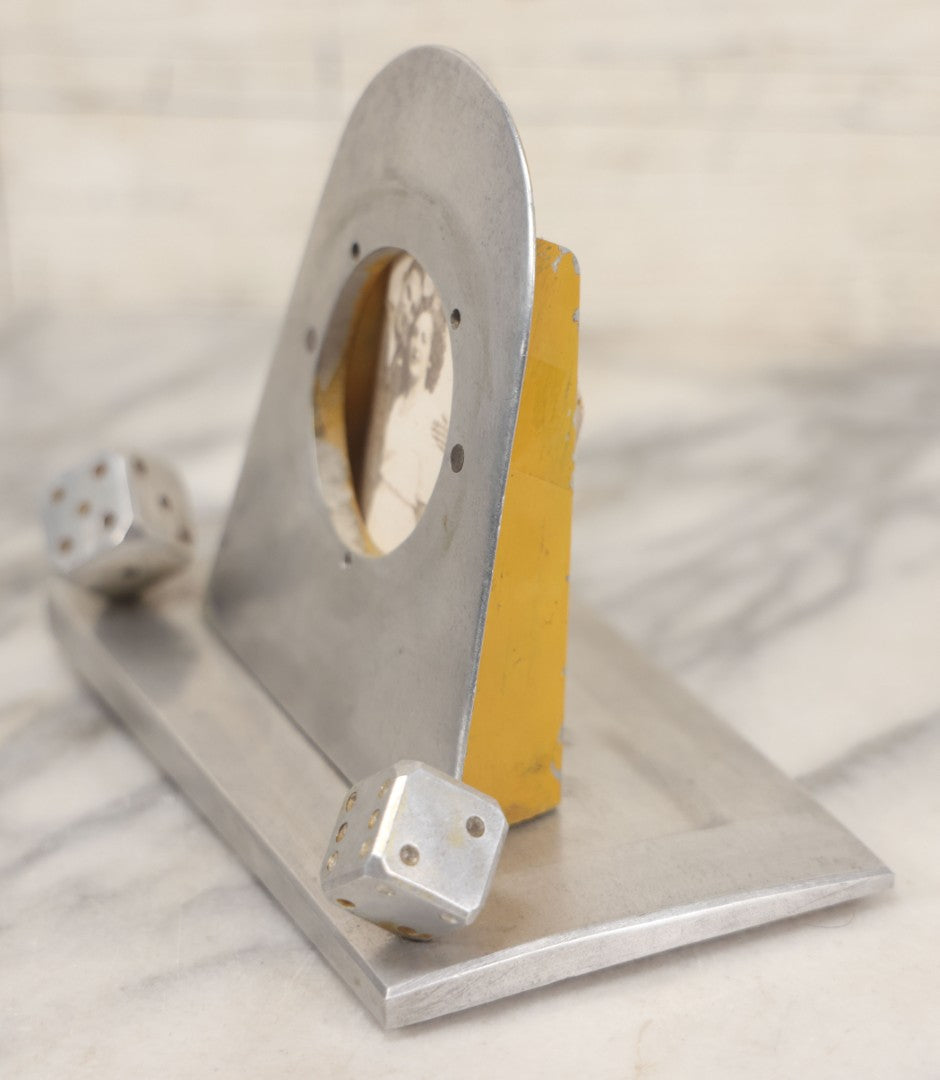Lot 005 - Vintage Machined Aluminum Photo Frame With Brushed Finish, With Balancing Dice, Navy Sweetheart Snapshot Photograph