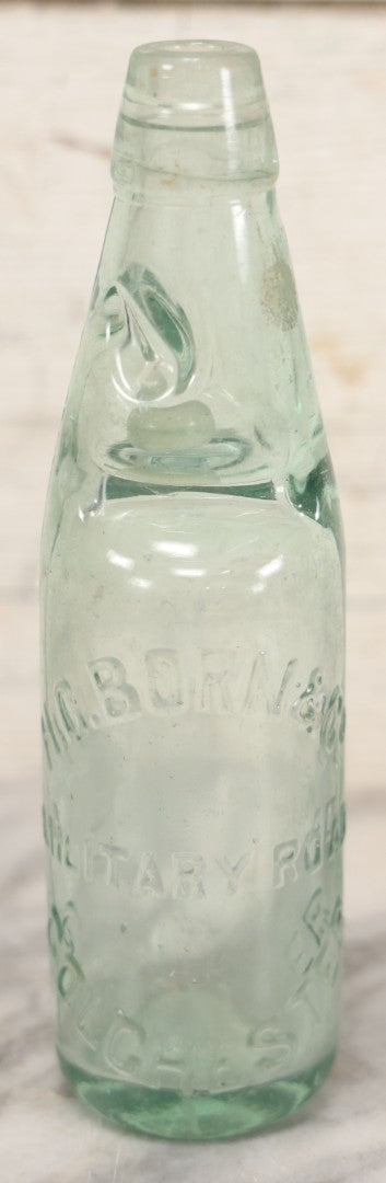 Lot 020 - Antique Codd-Neck Bottle With Raised Lettering "H.C. Born & Co Military Road Colchester," Trapped Glass Ball, 9" H