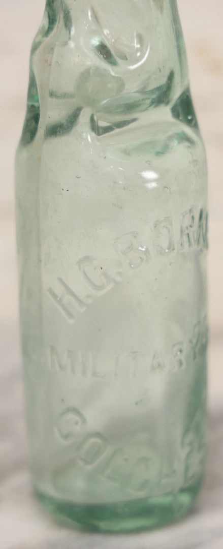 Lot 020 - Antique Codd-Neck Bottle With Raised Lettering "H.C. Born & Co Military Road Colchester," Trapped Glass Ball, 9" H