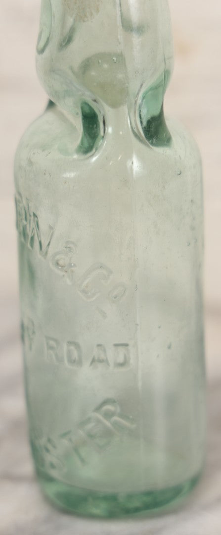 Lot 020 - Antique Codd-Neck Bottle With Raised Lettering "H.C. Born & Co Military Road Colchester," Trapped Glass Ball, 9" H