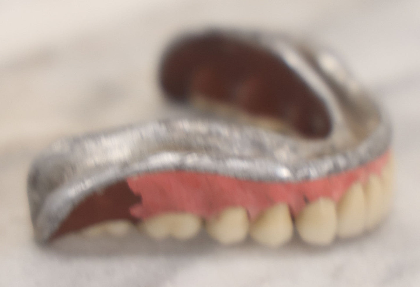 Lot 038 - Pair Of Vintage Dentures With Resin Teeth On Metal Dental Plate