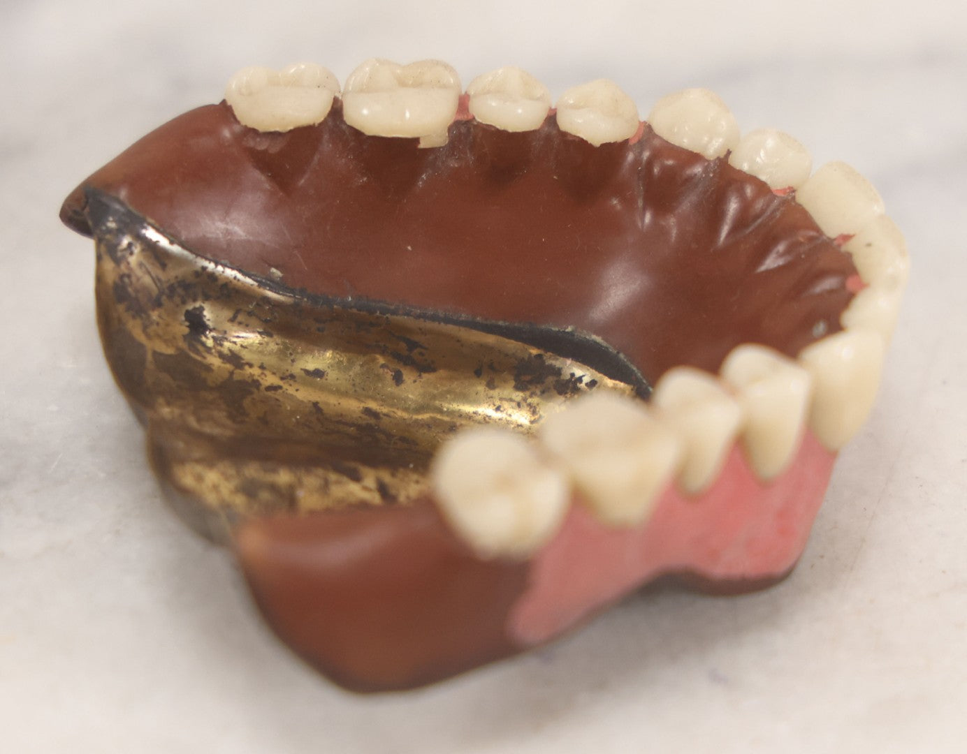 Lot 038 - Pair Of Vintage Dentures With Resin Teeth On Metal Dental Plate