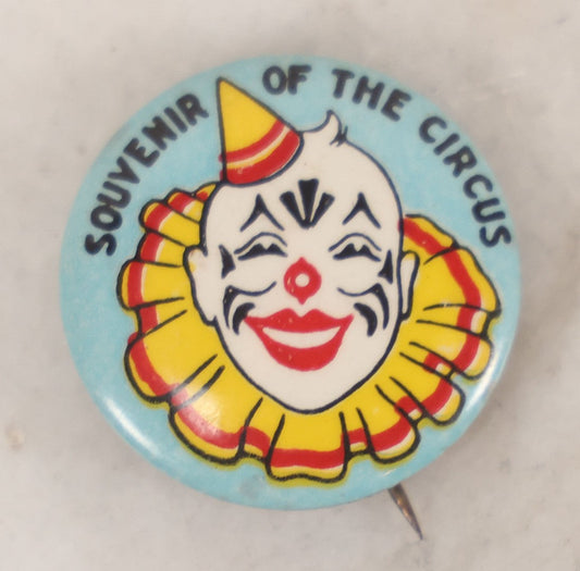 Lot 040 - Vintage "Souvenir Of The Circus" Pin Back Featuring Clown Illustration And Blue Surround, 1-1/4" Diameter