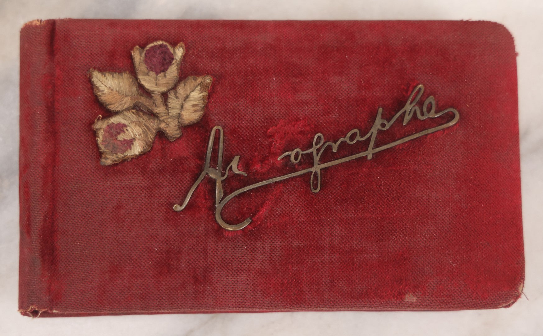 Lot 055 - Antique Victorian Red Velvet Autograph Album Of Lizzie, Hogarth Academy, Connecticut, 1880s With Student & Teacher Signatures, Hand-Drawn Comic Pencil Sketch, Die-Cut Lithographs & Painted Floral Page