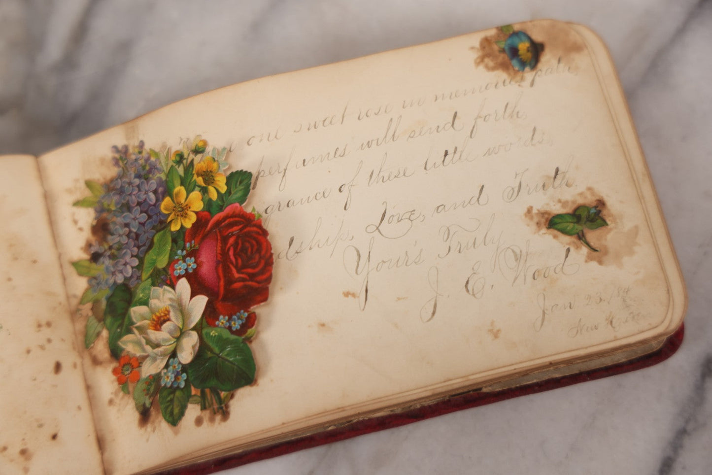 Lot 055 - Antique Victorian Red Velvet Autograph Album Of Lizzie, Hogarth Academy, Connecticut, 1880s With Student & Teacher Signatures, Hand-Drawn Comic Pencil Sketch, Die-Cut Lithographs & Painted Floral Page