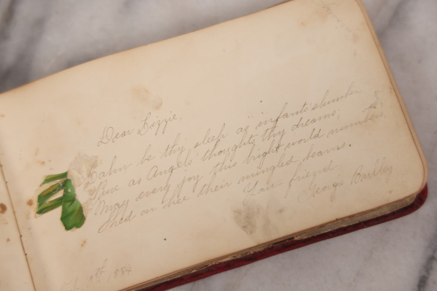 Lot 055 - Antique Victorian Red Velvet Autograph Album Of Lizzie, Hogarth Academy, Connecticut, 1880s With Student & Teacher Signatures, Hand-Drawn Comic Pencil Sketch, Die-Cut Lithographs & Painted Floral Page
