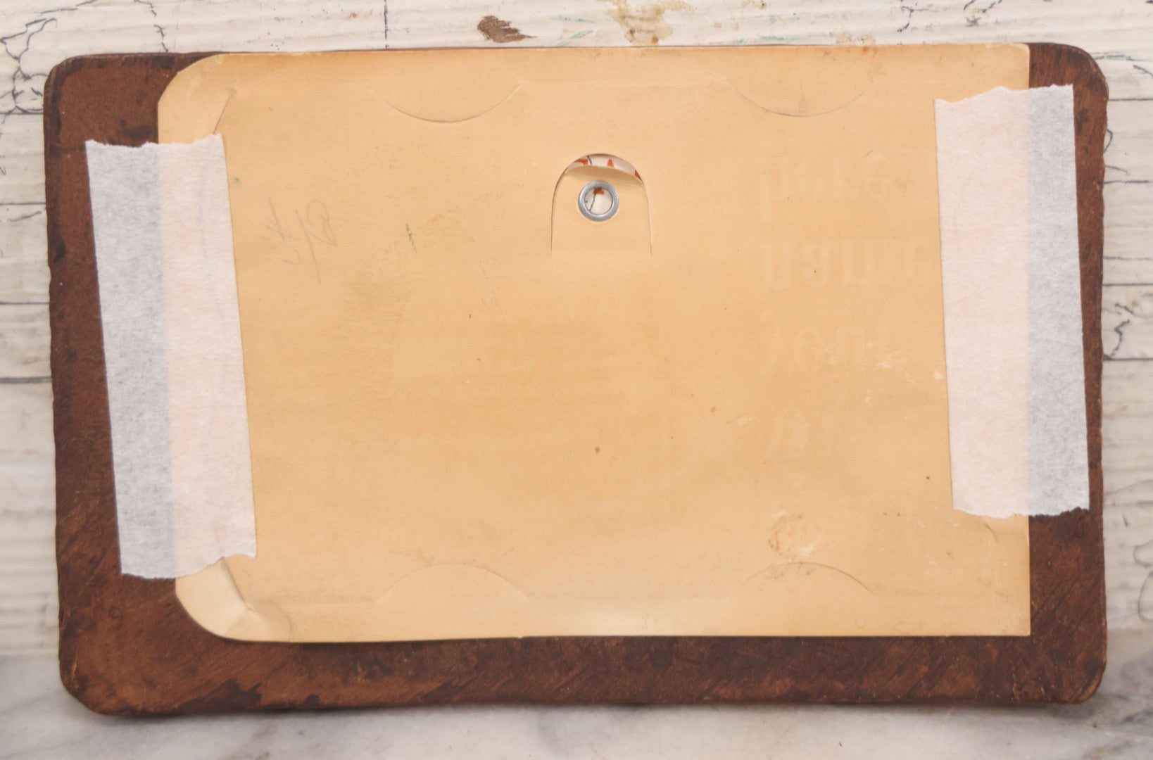 Lot 064 - Antique Molded Composite Photo Frame With Native American Motif, Souvenir Of White Mountains, New Hampshire, With Black And White Photo Postcard Of Five Kittens, 7-3/8" x 4-5/8"