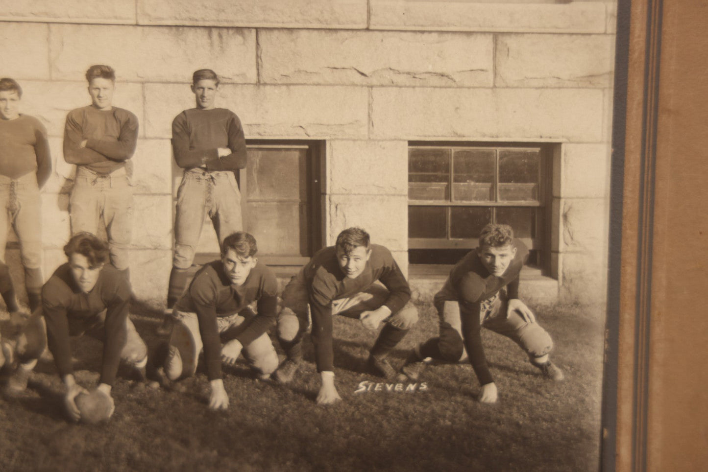 Lot 065 - Vintage Paper Framed Glossy Black And White Photo Of North Dakota State College Football Team, 1937, Featuring Jack Stevens