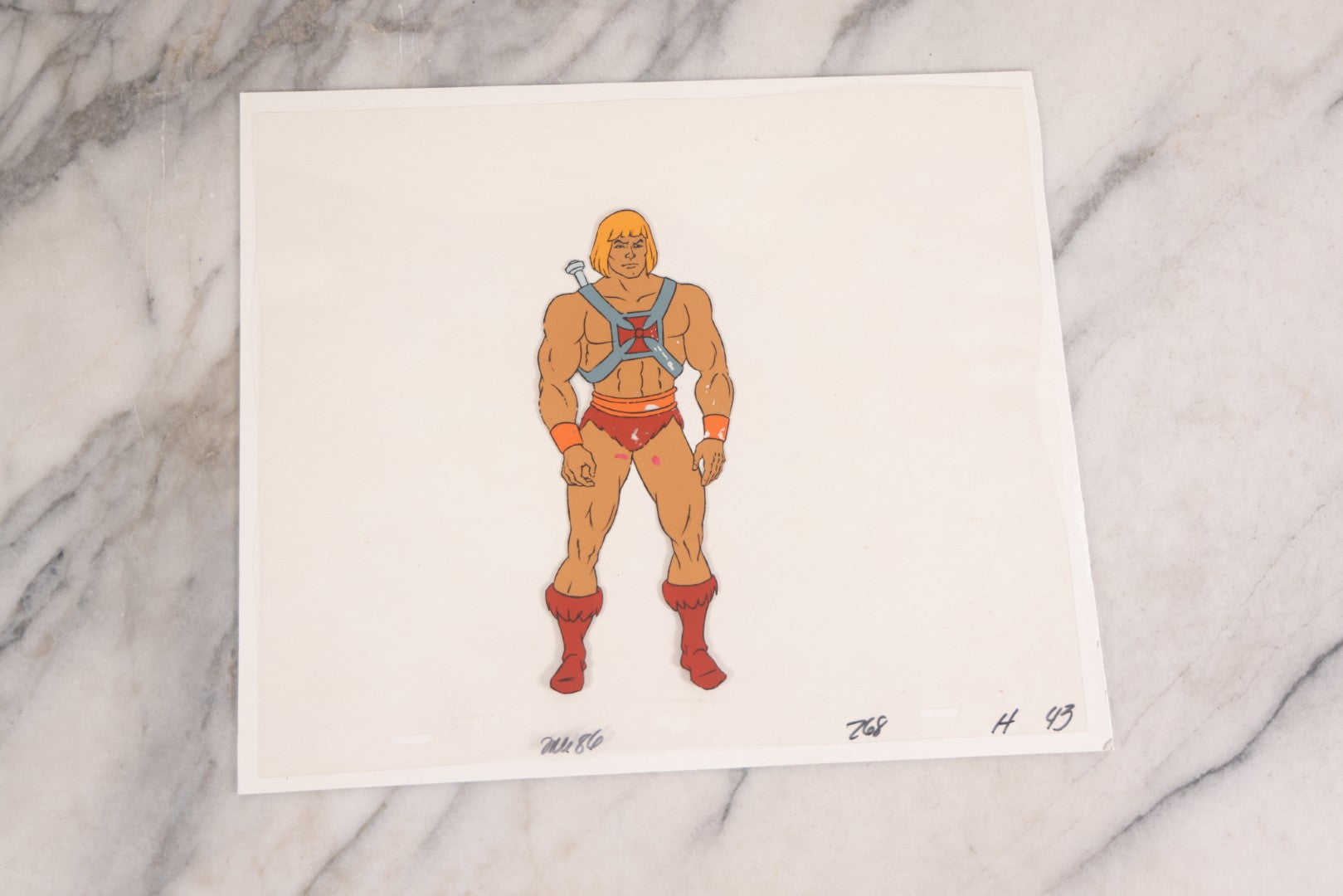 Lot 079 - Grouping Of Five Original Reverse-Painted Production Character Animation Cels On Celluloid From 1983 Cartoon "He-Man And The Masters Of The Universe," He-Man (2), Orko (2), And Teela (1)