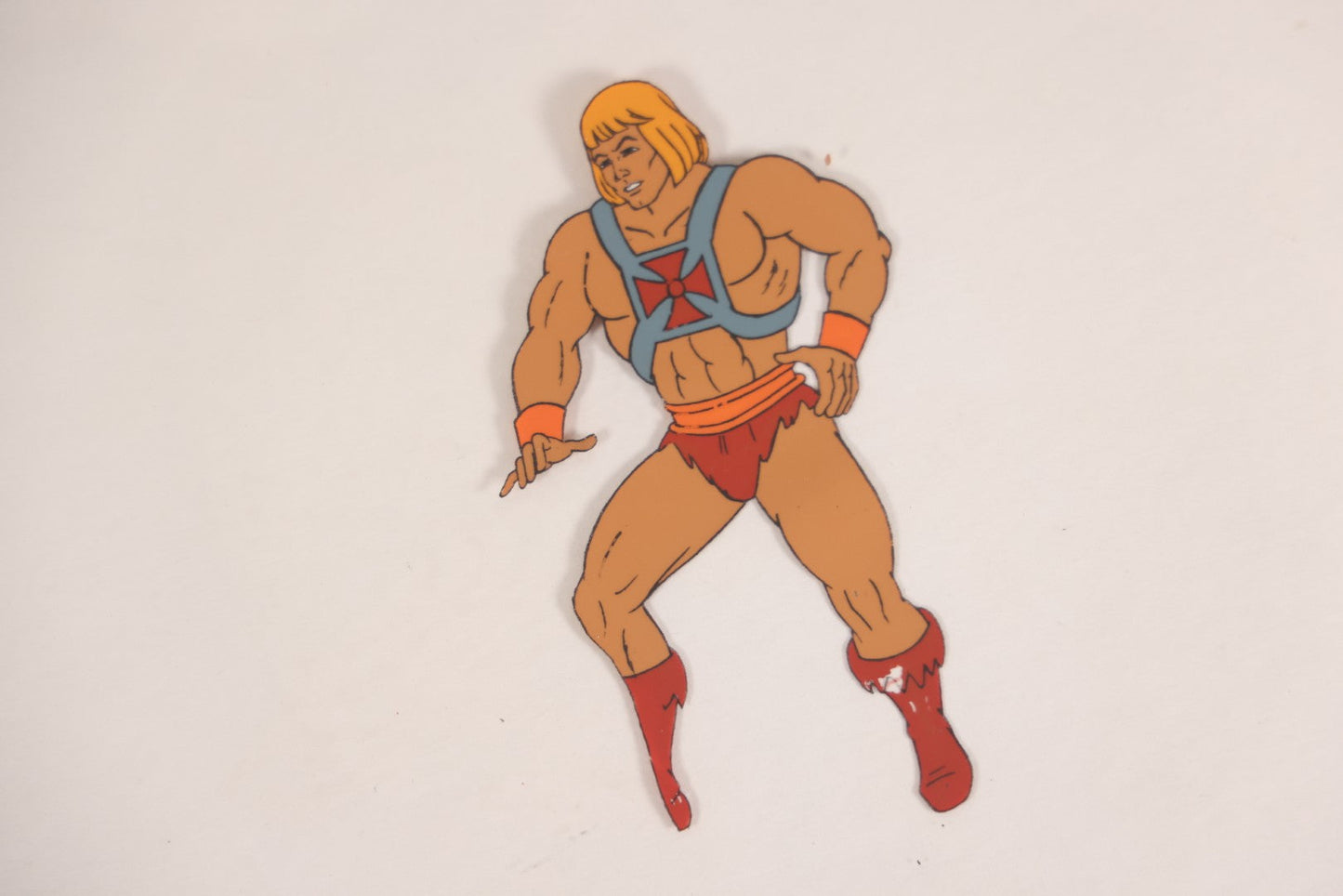 Lot 079 - Grouping Of Five Original Reverse-Painted Production Character Animation Cels On Celluloid From 1983 Cartoon "He-Man And The Masters Of The Universe," He-Man (2), Orko (2), And Teela (1)